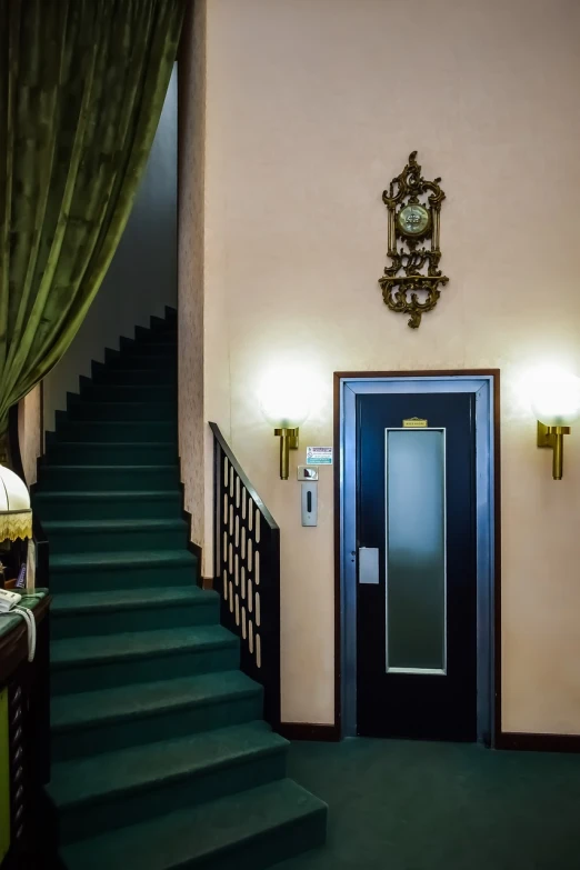 a hotel lobby with green carpet and stairs, a portrait, inspired by Georg Friedrich Schmidt, shutterstock, elevator, inside an old apartment, france, tiffany style