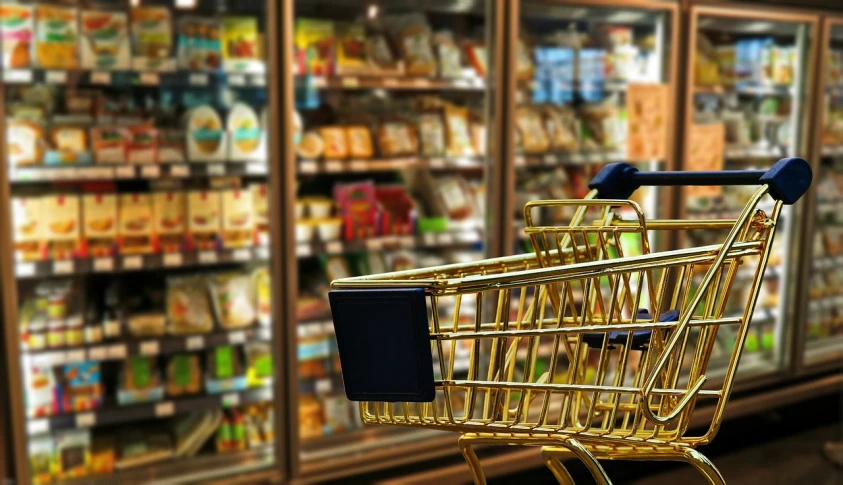 a shopping cart sitting in front of a grocery store, a digital rendering, by Dietmar Damerau, pexels, stacking supermarket shelves, full body close-up shot, 🦩🪐🐞👩🏻🦳, gold