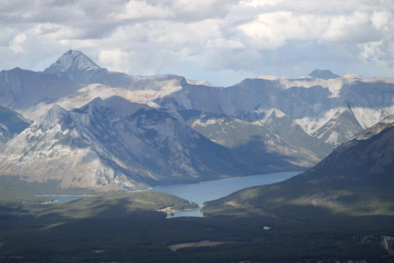 a large body of water surrounded by mountains, by Brigette Barrager, flickr, very detaile, banff national park, view from high, camp