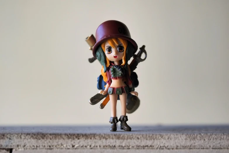 a figurine of a girl holding a skateboard, a picture, by Hiroyuki Tajima, pexels, anime girl with a bow and arrow, nami from one piece, soldier outfit, pepper
