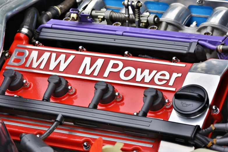 a close up of the engine of a car, a stock photo, by John Murdoch, shutterstock, synthetism, bmw m1, sticker, wild power, well edited