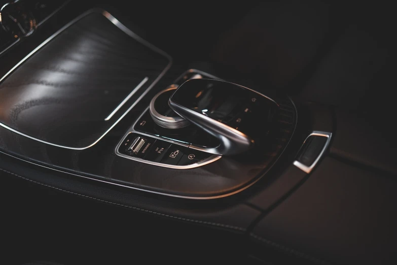 a close up of the center console of a car, by Elsa Bleda, mercedez benz, taken with canon 8 0 d, simplistic, modern photo