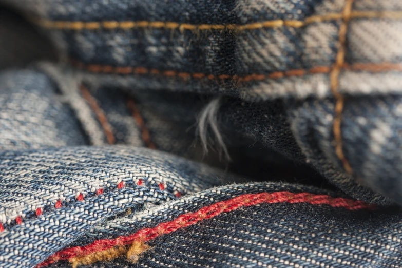 a close up of a pair of jeans, by Thomas Häfner, sōsaku hanga, high depth of field, mid shot photo