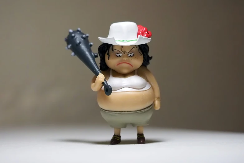 a figurine of a woman holding a baseball bat, a picture, unsplash, mingei, she has a jiggly fat round belly, luffy, scary angry pose, he is wearing a hat