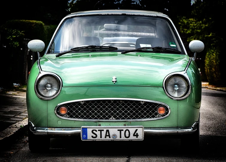 a green car parked on the side of the road, inspired by Kentaro Miura, flickr, sōsaku hanga, cute face, swedish style, sfw, springs