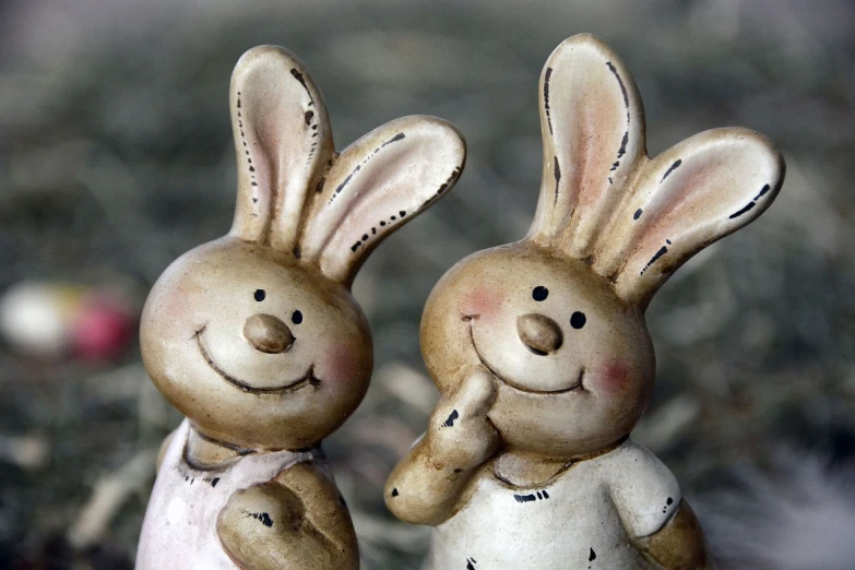 a couple of ceramic rabbits standing next to each other, a picture, by Maksimilijan Vanka, trending on pixabay, waving and smiling, avatar image, close - up photo, talking