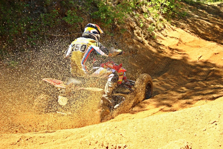 a man riding on the back of a dirt bike, a photo, flickr, wallpaper!, patrick nagle!!, wipe out, in the hillside