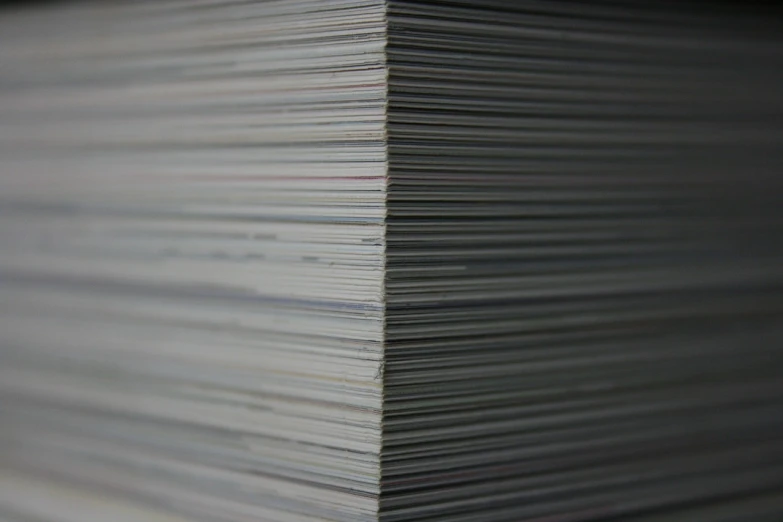 a stack of papers sitting on top of each other, a picture, by Jan Rustem, profile close-up view, microdetails, thick lines, uploaded