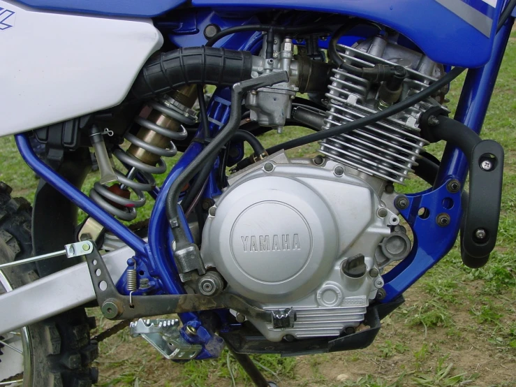 a close up of the engine of a motorcycle, a picture, flickr, motocross bike, kobalt blue, very very well detailed image, 2 0 0 0