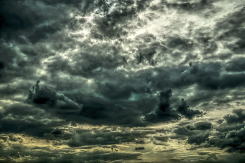 a large body of water under a cloudy sky, a picture, by Hans Schwarz, pexels, romanticism, dark mammatus cloud, hdr!, hdr detail, background ( dark _ smokiness )