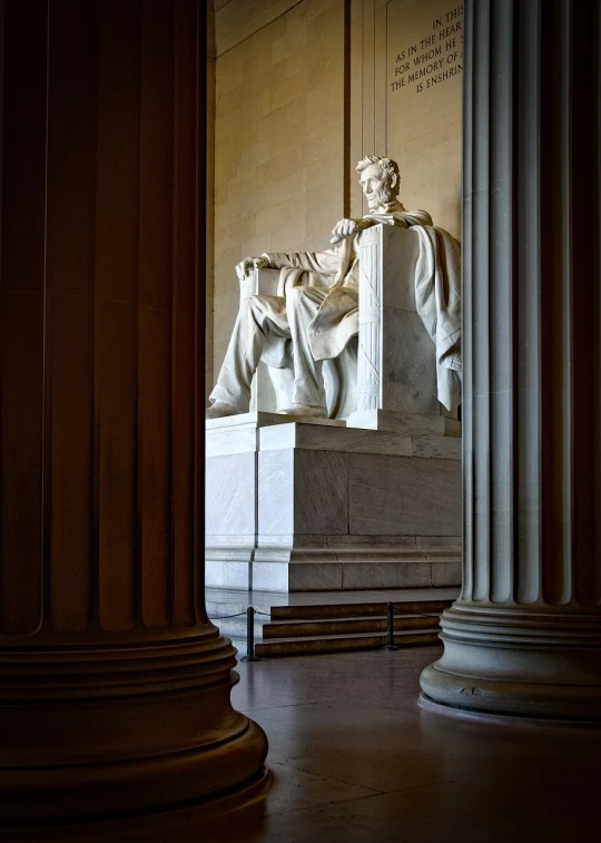 a statue of abraham lincoln in the lincoln memorial, by Andrew Domachowski, visual art, sitting on a stone throne, giant majestic archways, vertical portrait, perfect light