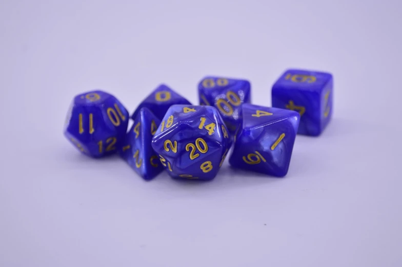 a bunch of blue dice sitting on top of a table, a portrait, academic art, brilliant royal blue, heavenly marble, high detail product photo