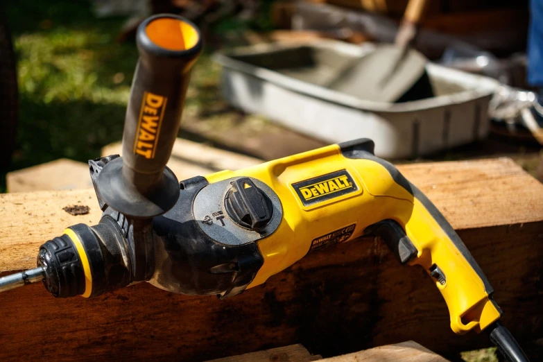 a dew dew dew dew dew dew dew dew dew dew dew dew dew dew dew dew dew dew dew dew dew dew dew dew dew dew dew, a portrait, inspired by Balázs Diószegi, pixabay, dada, chainsaw attached to hand, big hammer, on a yellow canva, 35 mm product photo”