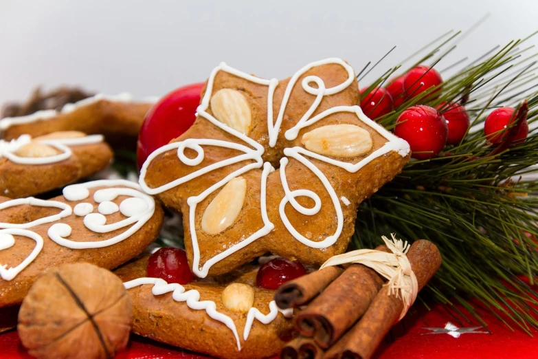 a close up of a plate of cookies on a table, by Aleksander Gierymski, pexels, folk art, decorated ornaments, cinnamon, istockphoto, caramel