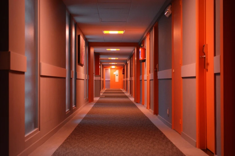 a long hallway with a light at the end of it, process art, orange color scheme, hotel room, alex miranda, many floors