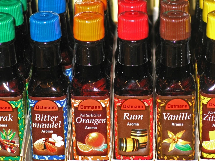 a row of different flavored syrups on a shelf, a picture, by Dietmar Damerau, cinnamon, brilliant detail, markers, storm