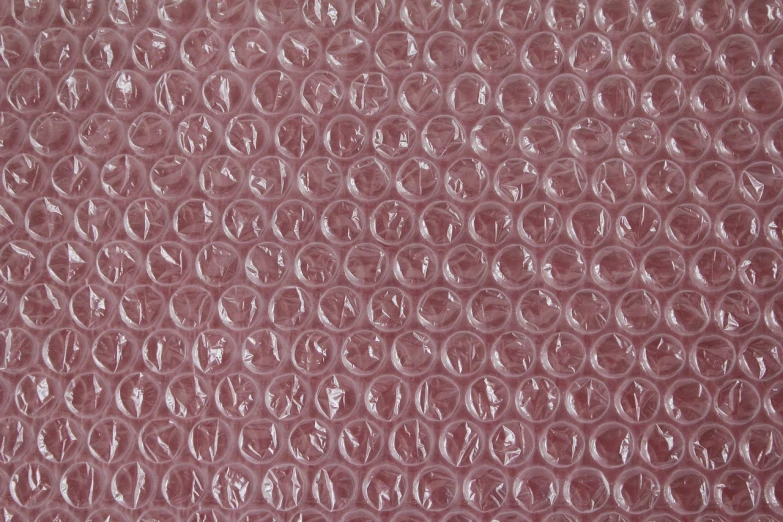 a close up of a pink plastic material, a stock photo, magic bubble barrier, packshot, close-up product photo, 5 mm