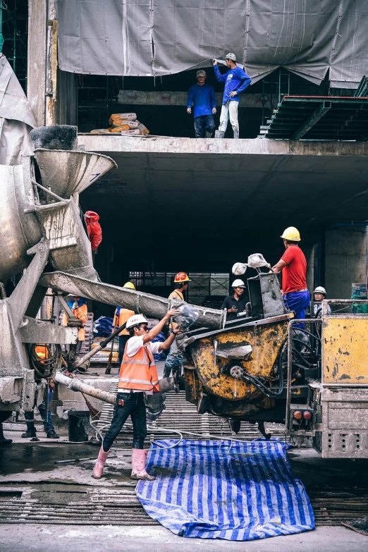 a group of men working on a construction site, pexels contest winner, constructivism, polished concrete, 🦩🪐🐞👩🏻🦳, mechanised, bustling