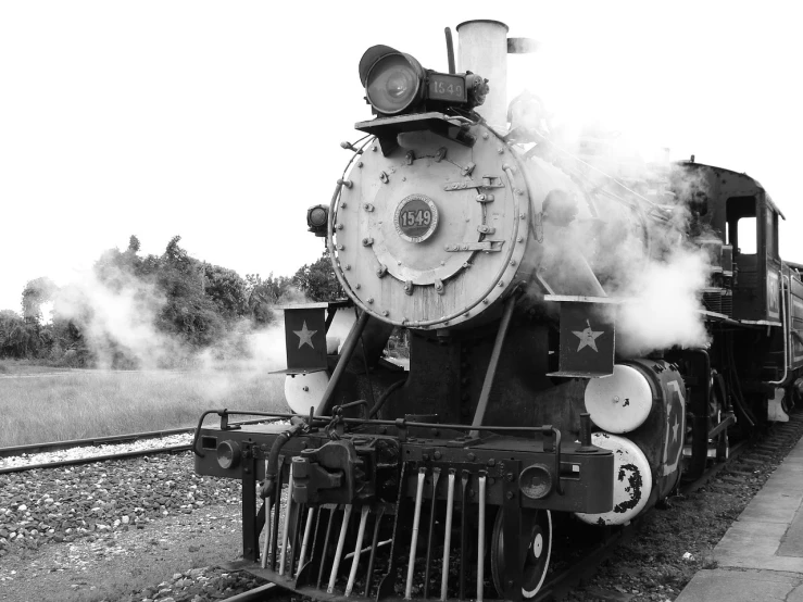 a black and white photo of a steam engine, a portrait, by Pat Adams, flickr, taken on iphone 14 pro, oklahoma, a train in red dead redemption 2, cleaned up