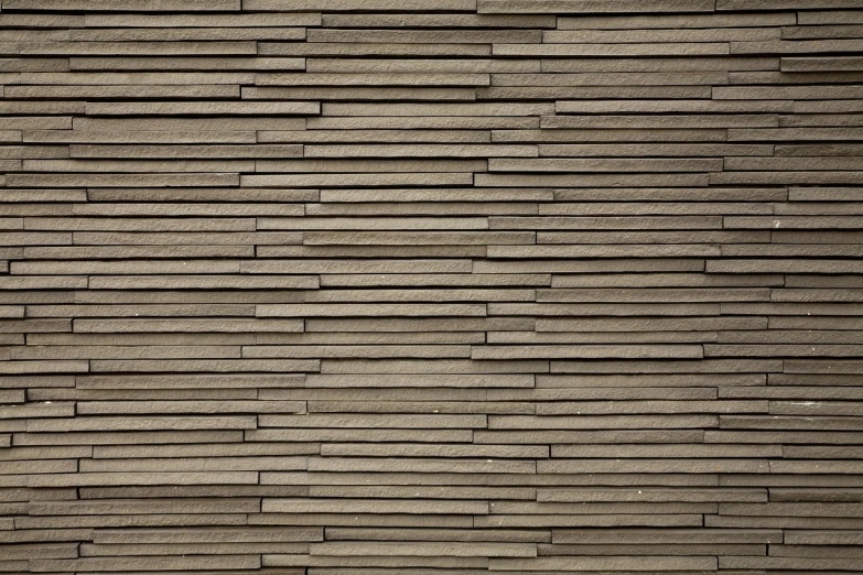 a fire hydrant sitting in front of a brick wall, a stock photo, inspired by Andreas Gursky, bauhaus, taupe, stylized stone cladding texture, very elongated lines, wood panels