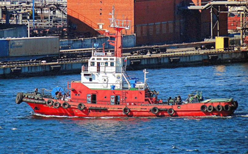 a red tug boat in the middle of a body of water, a portrait, by Lorraine Fox, new york harbour, not cropped, siren, petros