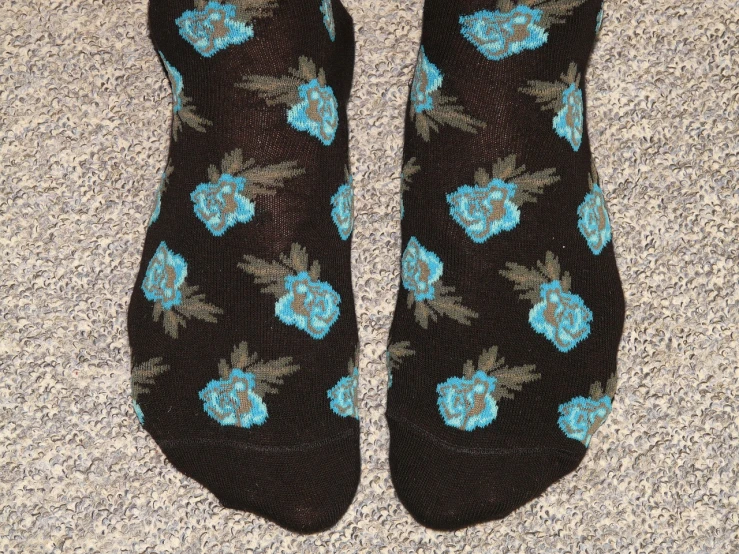 a pair of black socks with blue flowers on them, flickr, bottom - view, rose, menacing!, pattern