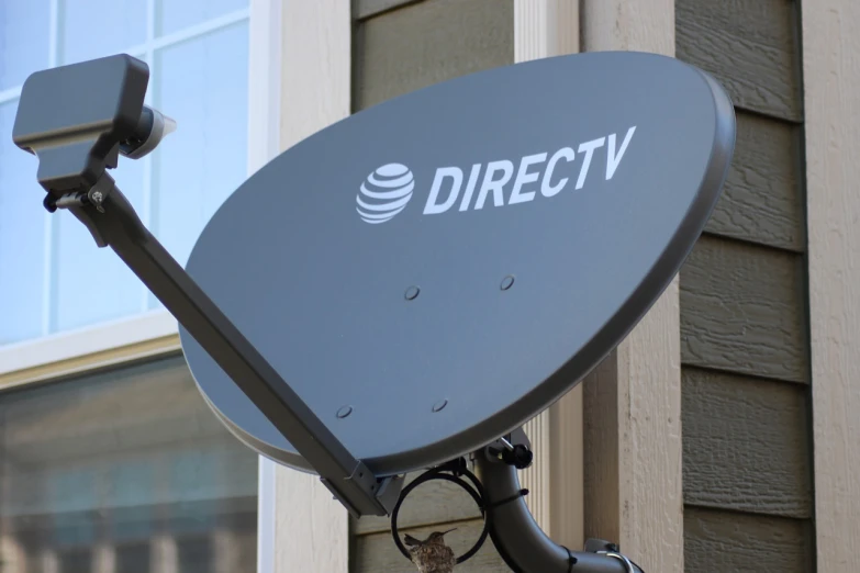 a satellite dish sitting on the side of a building, tv commercial, direct lighting, arrow, discord