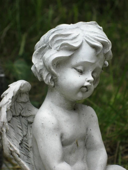 a statue of an angel sitting on a bench, pexels, closeup of an adorable, shaded, years old, guido
