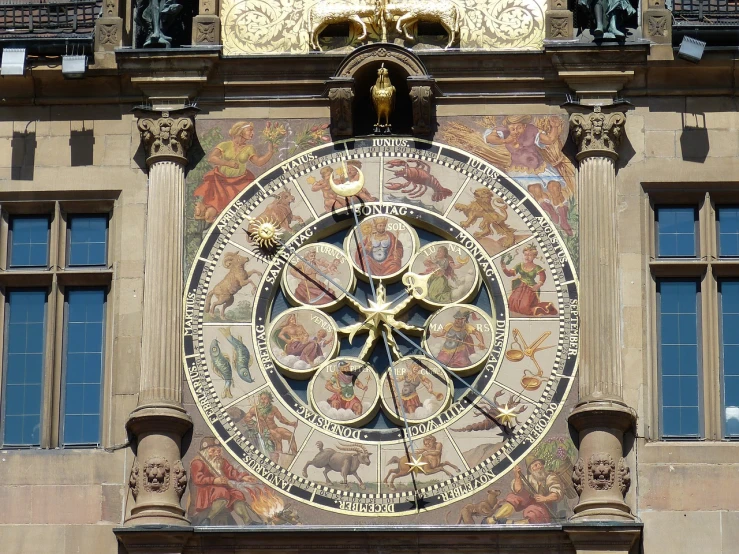 a large clock on the side of a building, by Anton Räderscheidt, flickr, renaissance, centered in panel, pisces, camel, slice of life”