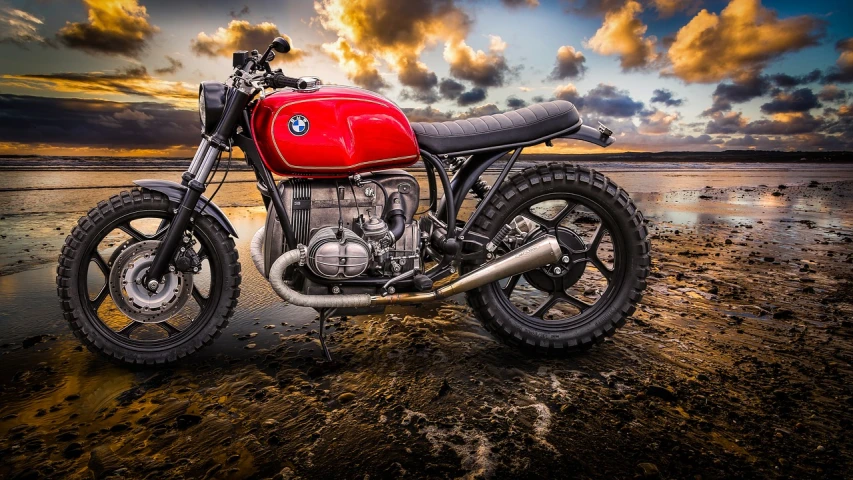 a red motorcycle parked on top of a sandy beach, a portrait, inspired by Alex Petruk APe, unsplash, photorealism, bmw, vintage - w 1 0 2 4, hyperrealistic flickr:5, stained”