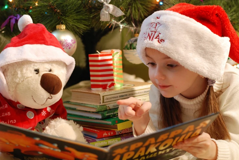a little girl reading a book to a teddy bear, a picture, christmas tree, profile pic, 3 4 5 3 1, cat in the hat