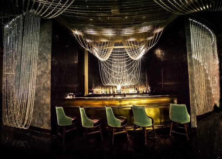 a group of green chairs sitting in front of a bar, trending on cg society, baroque, draped in crystals, dubai, qualia, chains hanging from ceiling