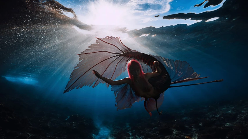 a woman holding an umbrella in the ocean, by Robert Jacobsen, unsplash contest winner, surrealism, underwater sea dragon, sunflare, stained glass wings, ross tran and wlop