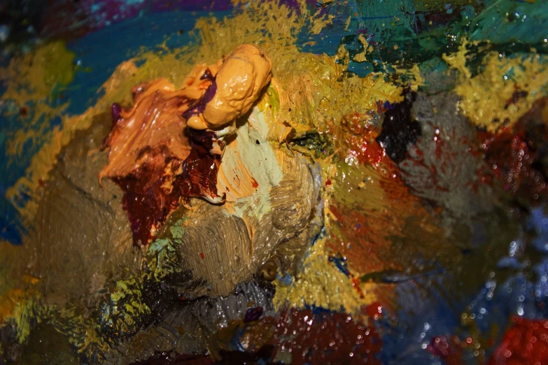 a close up of a palette with paint on it, a detailed painting, inspired by Asger Jorn, flickr, lyrical abstraction, ochre, detail on scene, made of wax and oil, warm deep colours