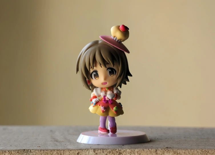 a close up of a figurine on a table, a picture, flickr, haruhi suzumiya, cupcake, y 2 k cutecore clowncore, chibi proportions