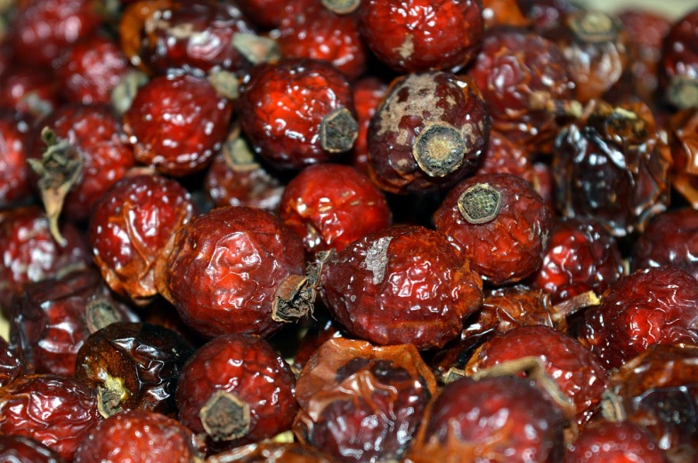 a close up of a bunch of red berries, a photo, pus - filled boils, close-up product photo, well preserved, dried blood