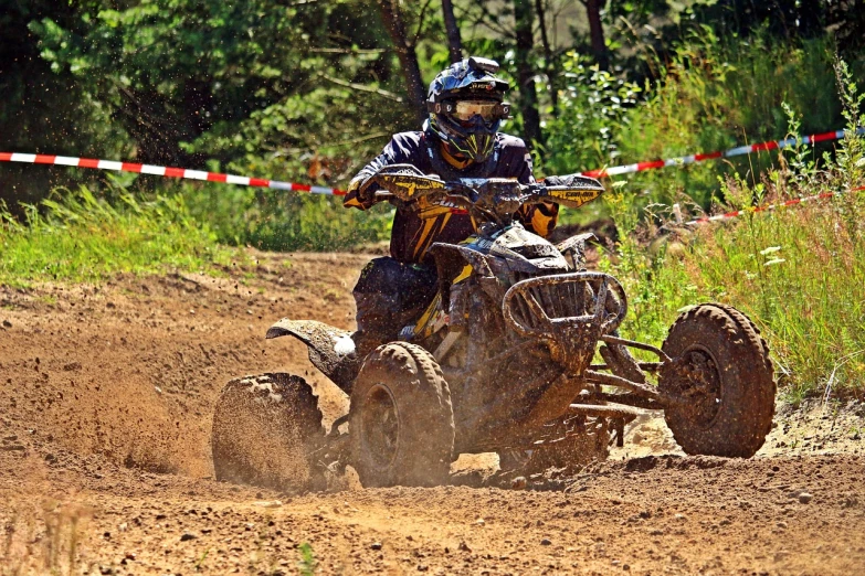 a man riding on the back of a dirt bike, a photo, by Ivan Grohar, shutterstock, process art, all terrain vehicle race, buggy, panels, motorbikers race in hell