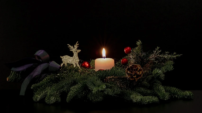 a lit candle sitting on top of a christmas wreath, a picture, inspired by Rudolph F. Ingerle, - h 1 0 2 4, dark backround, video still, detailed zoom photo
