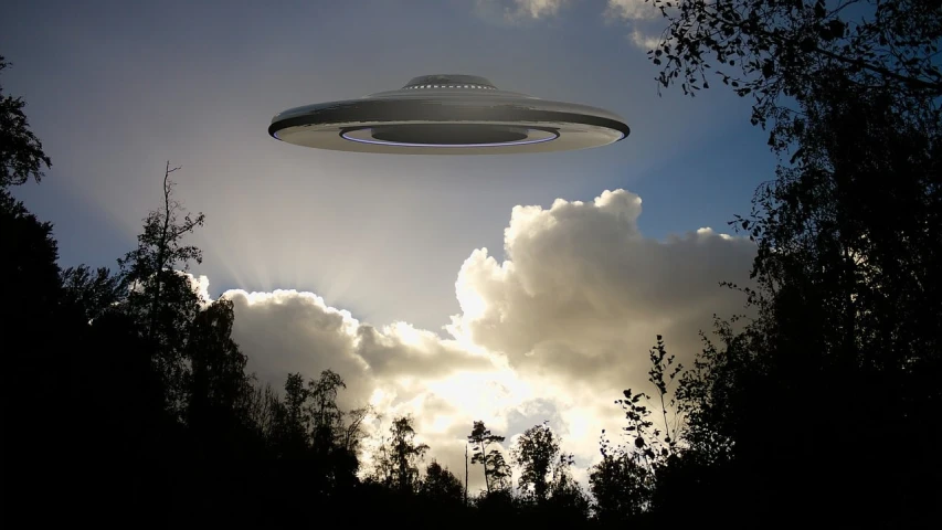 a close up of a flying object in the sky, a digital rendering, by Jon Coffelt, ufo in a forest, phot, abduction, flying saucer in the sky