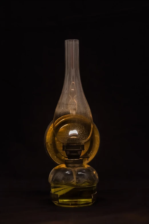 a glass vase sitting on top of a table, by James Warhola, renaissance, gold dripping in spiral, bubble chamber, front view dramatic, torch - lit