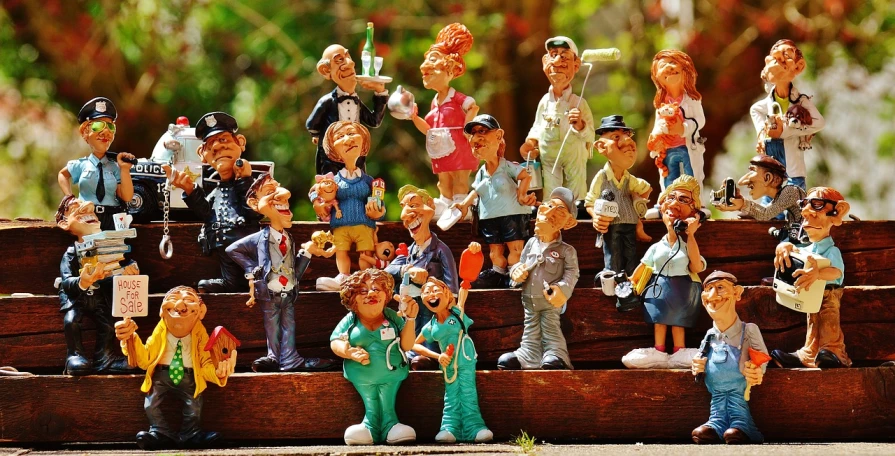 a group of figurines sitting on top of a wooden bench, trending on pixabay, caricaturist, rich detail, joyous, amazingly composed image