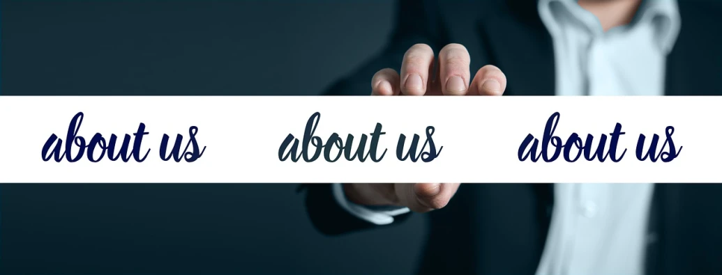 a man in a suit holding a sign that says what it's about us about us, a picture, pixabay, commercial banner, looking from slightly below, technical, randy bishop