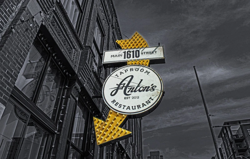 a black and white photo of a restaurant sign, a photo, by Tom Palin, featured on zbrush central, restored colors, halation, wafflehouse, cover shot