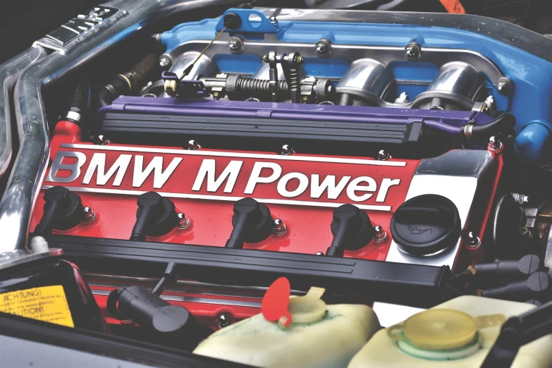 a close up of the engine of a car, a stock photo, by John Murdoch, synthetism, bmw m1, sonic power, banner, acronym