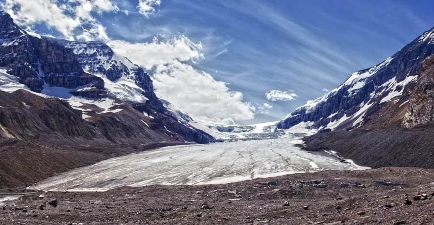 a group of people standing on top of a mountain, a tilt shift photo, by Erik Pevernagie, glacier landscape, wide long view, hdr!, canada