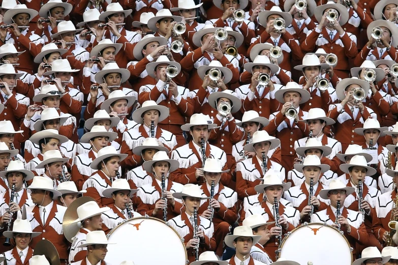a large group of people dressed in red and white, by Robert Childress, tumblr, cowboys, sousaphone, photograph credit: ap, detail shot