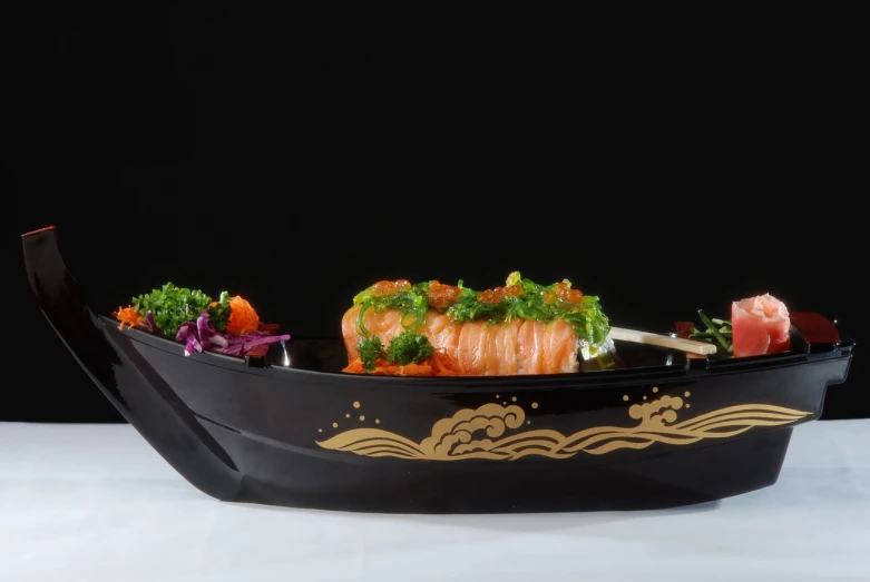 a close up of a plate of food on a table, sōsaku hanga, tabletop model, gondola, in style of kyrill kotashev, salmon