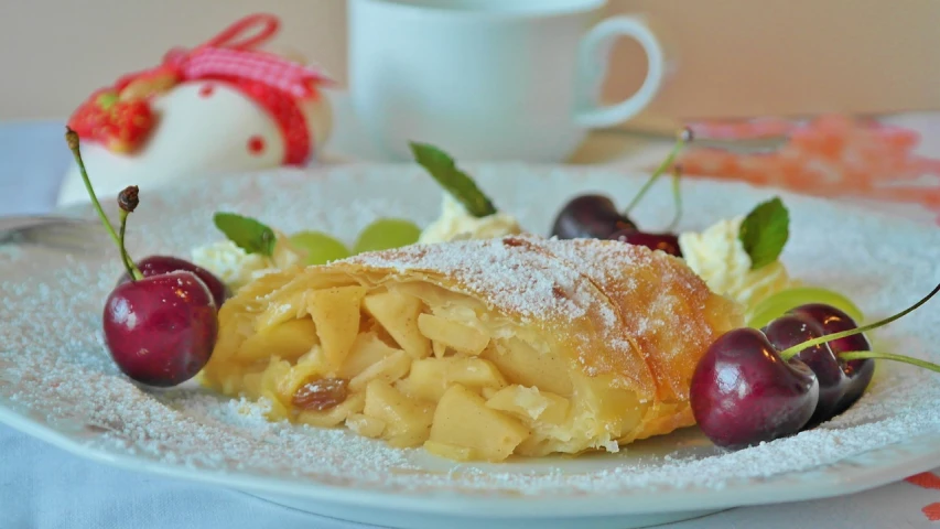 a close up of a plate of food on a table, inspired by Károly Patkó, apple pie, high quality product image”, cherry, soft!!