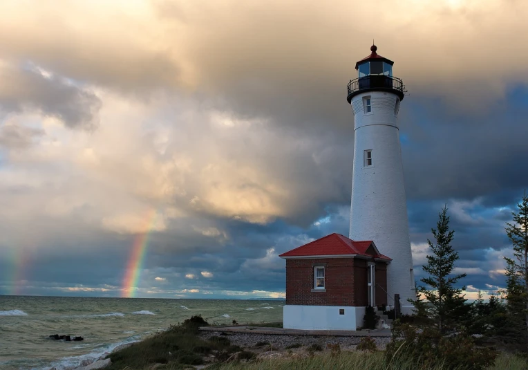 a lighthouse with a rainbow in the background, a photo, by Greg Rutkowski, renaissance, autumn light, white, usa-sep 20, michigan