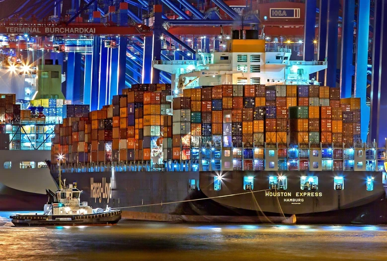 a large container ship in a large body of water, a stock photo, by Bernardino Mei, maximalism, busy night, 🦩🪐🐞👩🏻🦳, ergonomic, organized